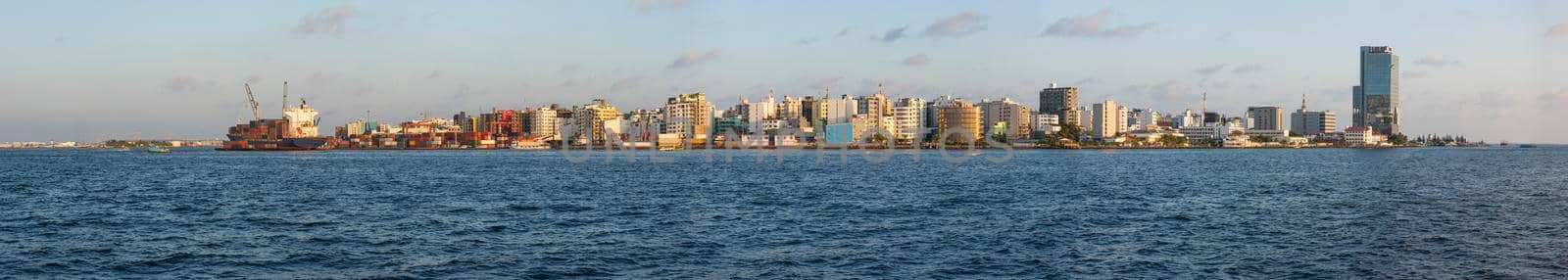 Panoramic view of large island city of Male in Maldives by paulvinten