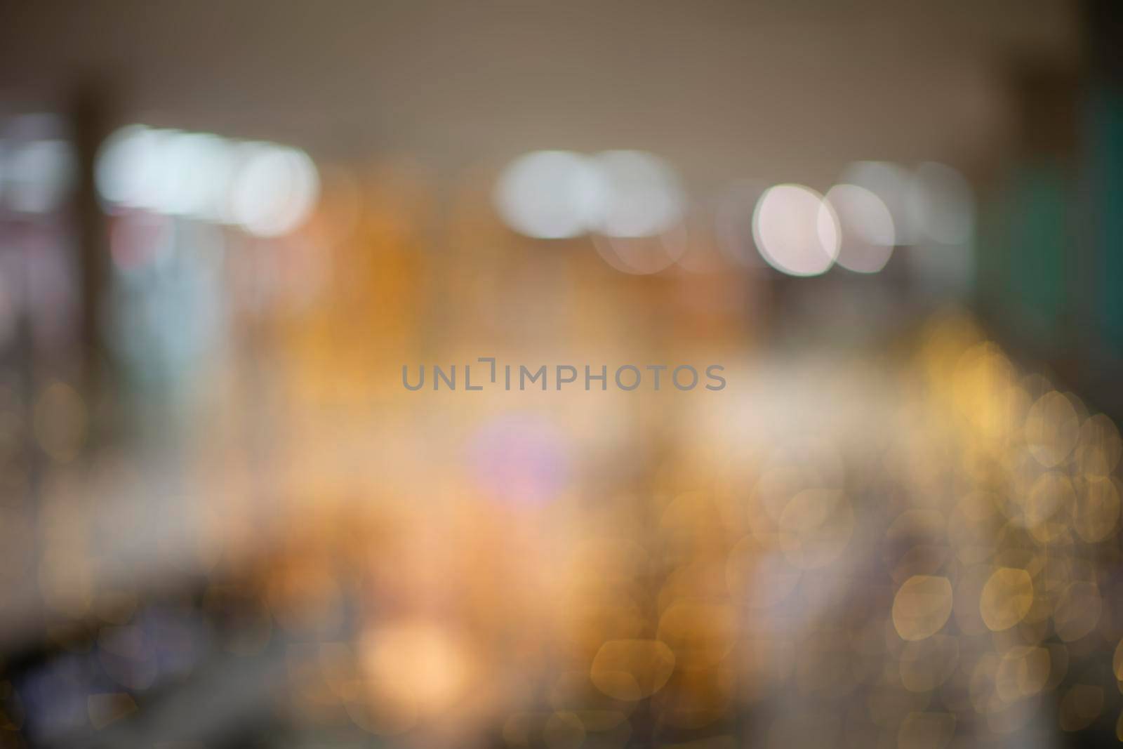 Blurred background of city lights. Golden blurred bokeh.