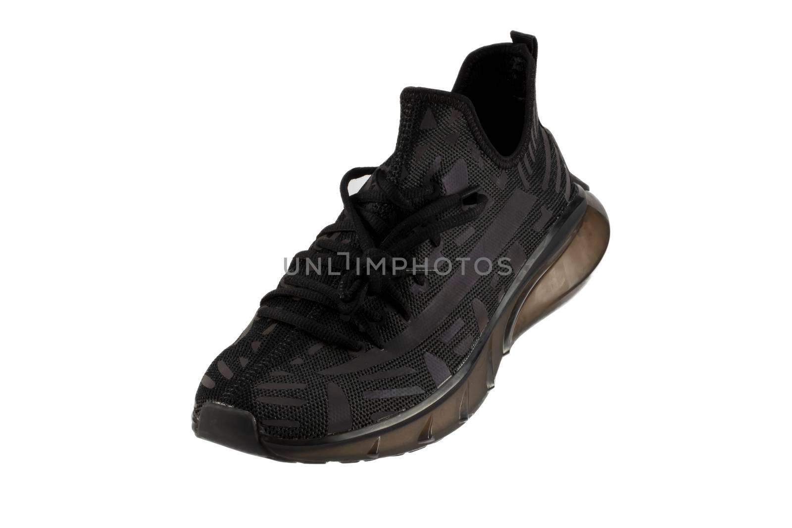 Black rag sneaker on a white background.