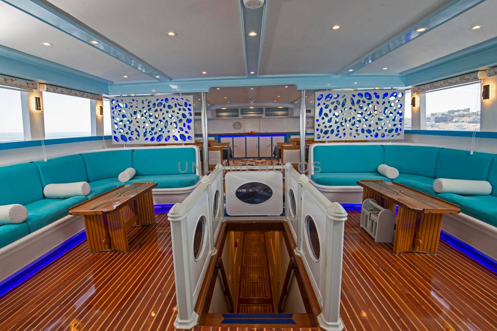 Interior design of large salon area on luxury motor yacht by paulvinten