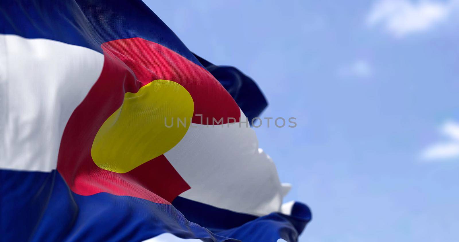 the flag of the US state of Colorado waving in the wind by rarrarorro