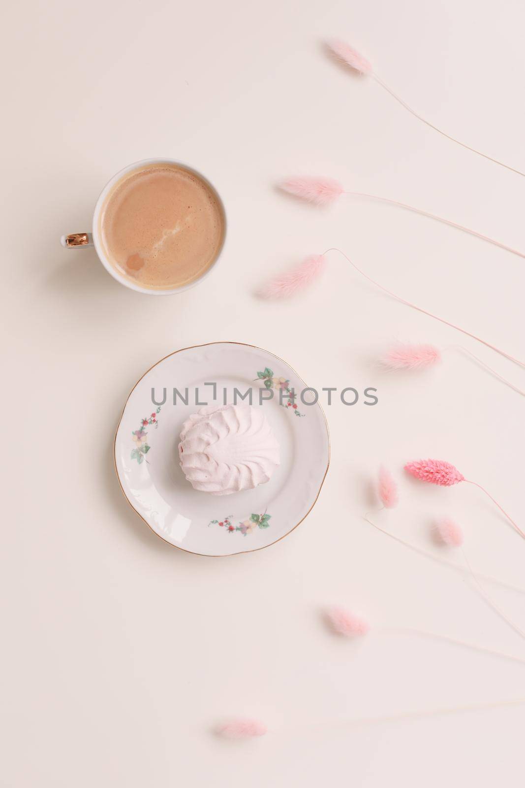 Good morning banner. Cup of coffee and homemade dessert zephyr. Top view. Food Photography with copy space. A cup of coffee and an airy marshmallow. Culinary background.