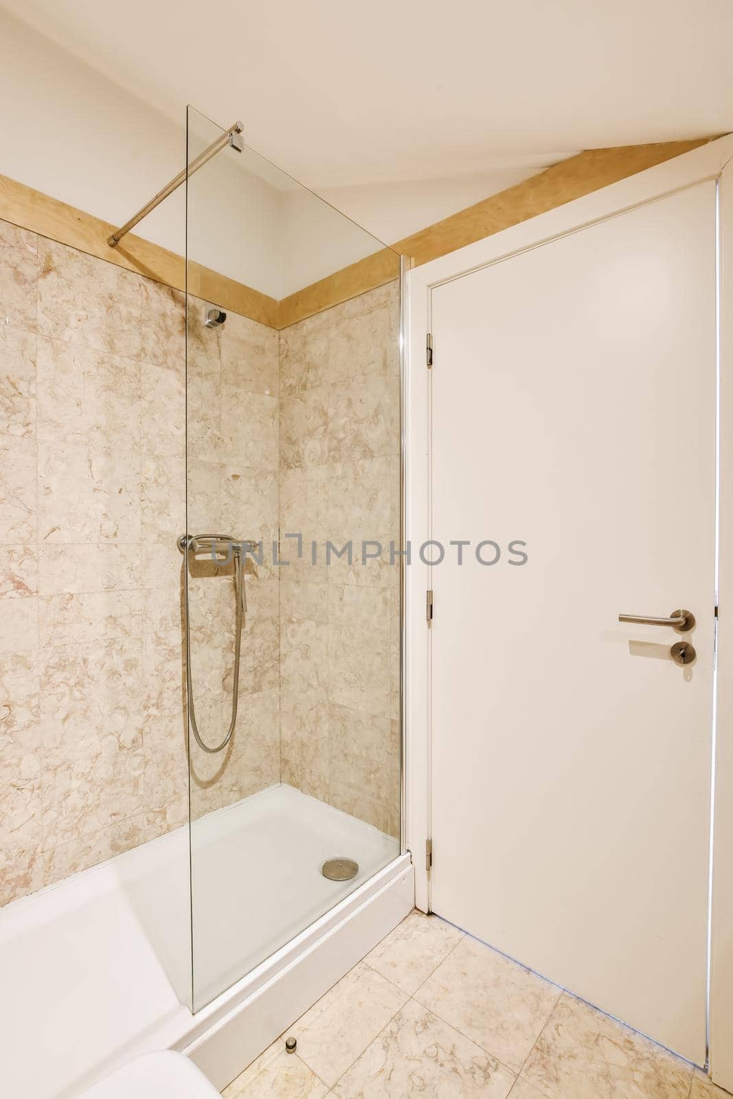 Luxury bathroom design with beige marble and tiled floor