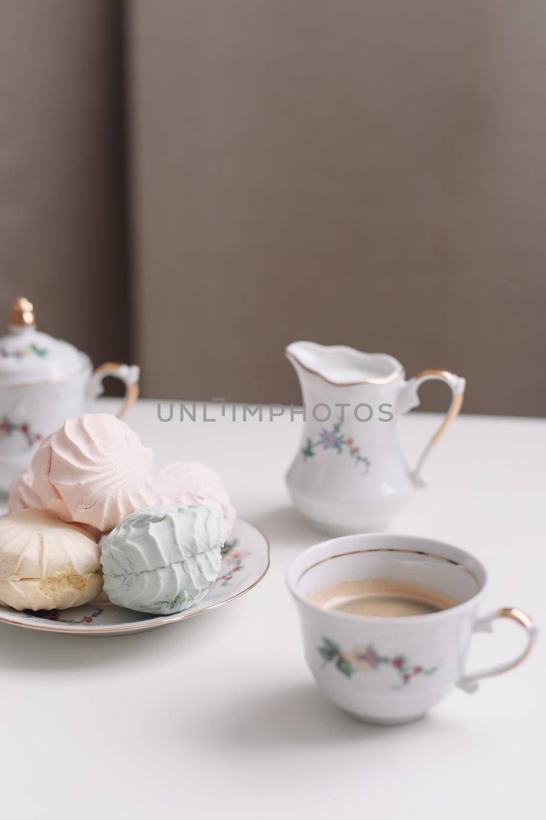 Good morning banner. Cup of coffee and homemade dessert zephyr. Top view. Food Photography with copy space. A cup of coffee and an airy marshmallow. Culinary background.