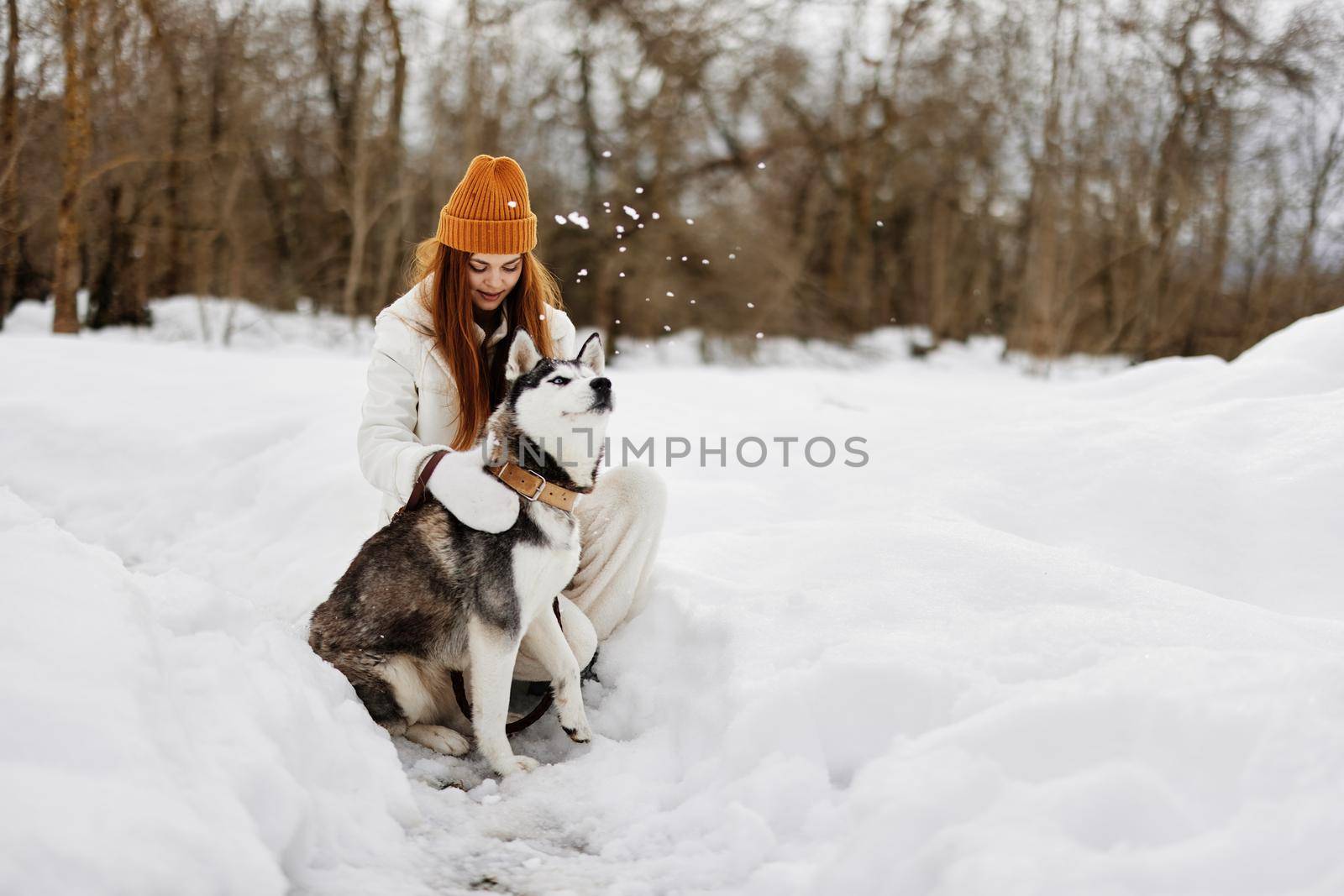 cheerful woman winter walk outdoors friendship winter holidays by SHOTPRIME