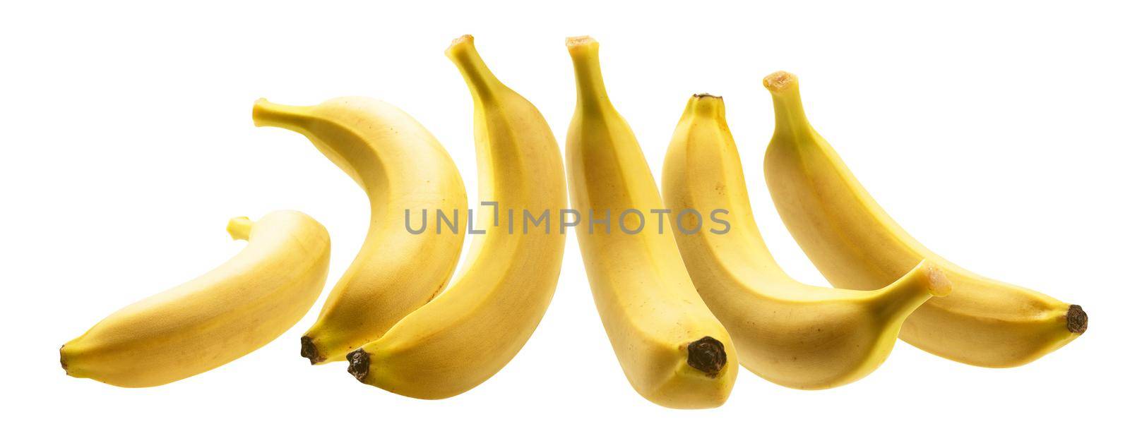 Yellow bananas levitate on a white background.