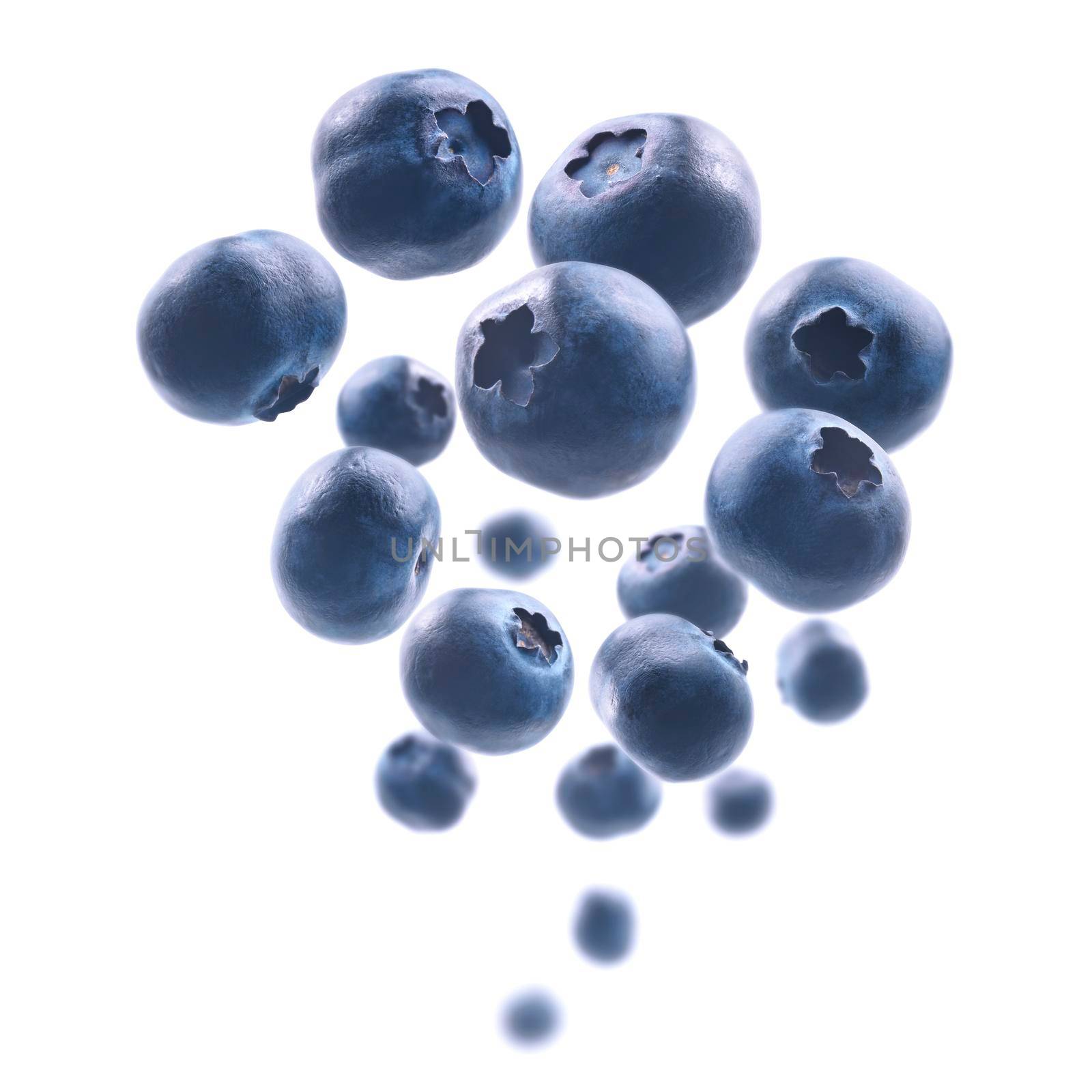 Ripe blueberries levitate on a white background.