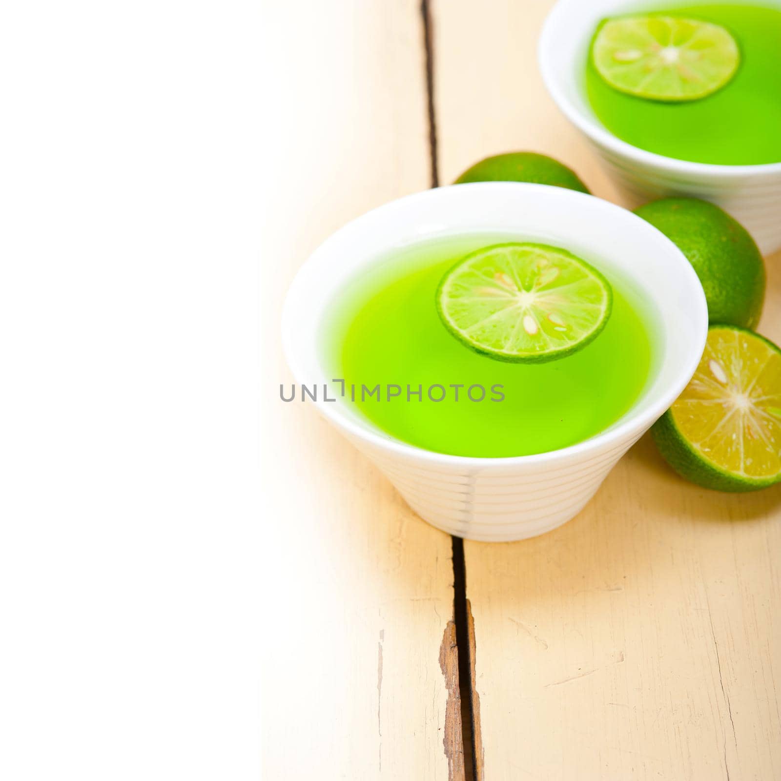 fresh and healthy green lime lemonade macro closeup 