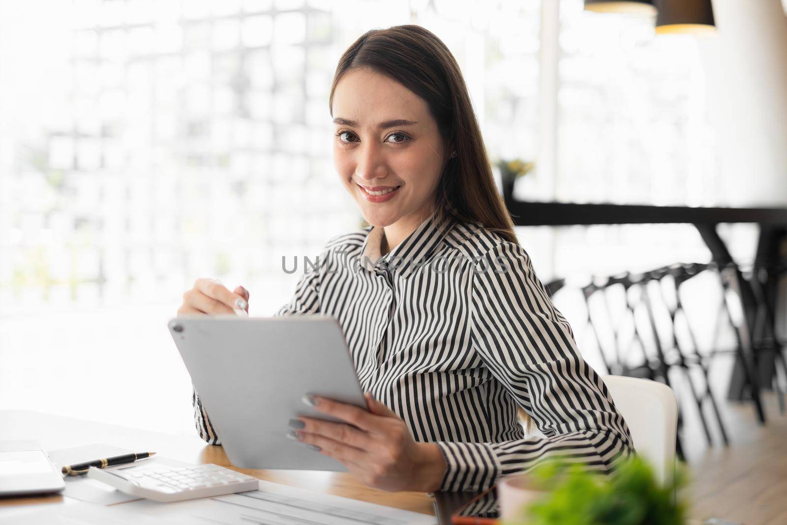 A successful entrepreneur analyzing a technical price graph and indicator. The concept of a bank account, a savings account, or an insurance policy