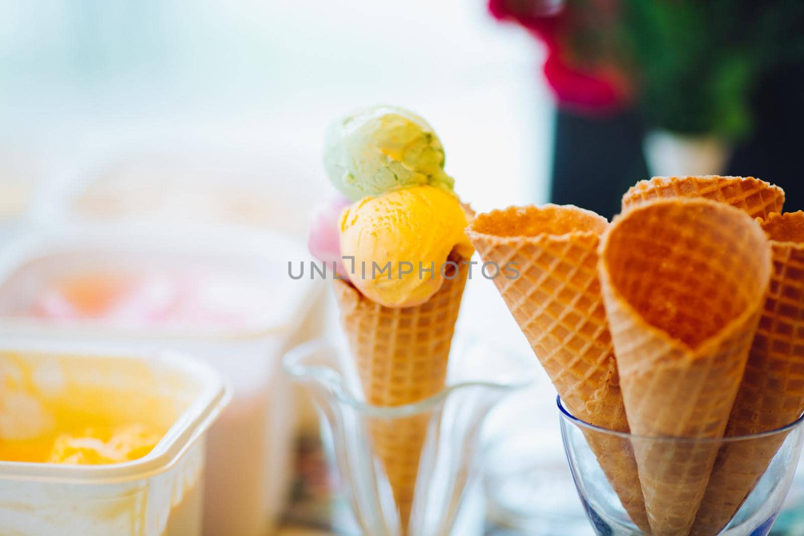 Empty waffle cone in glass for ice cream. by StudioLucky