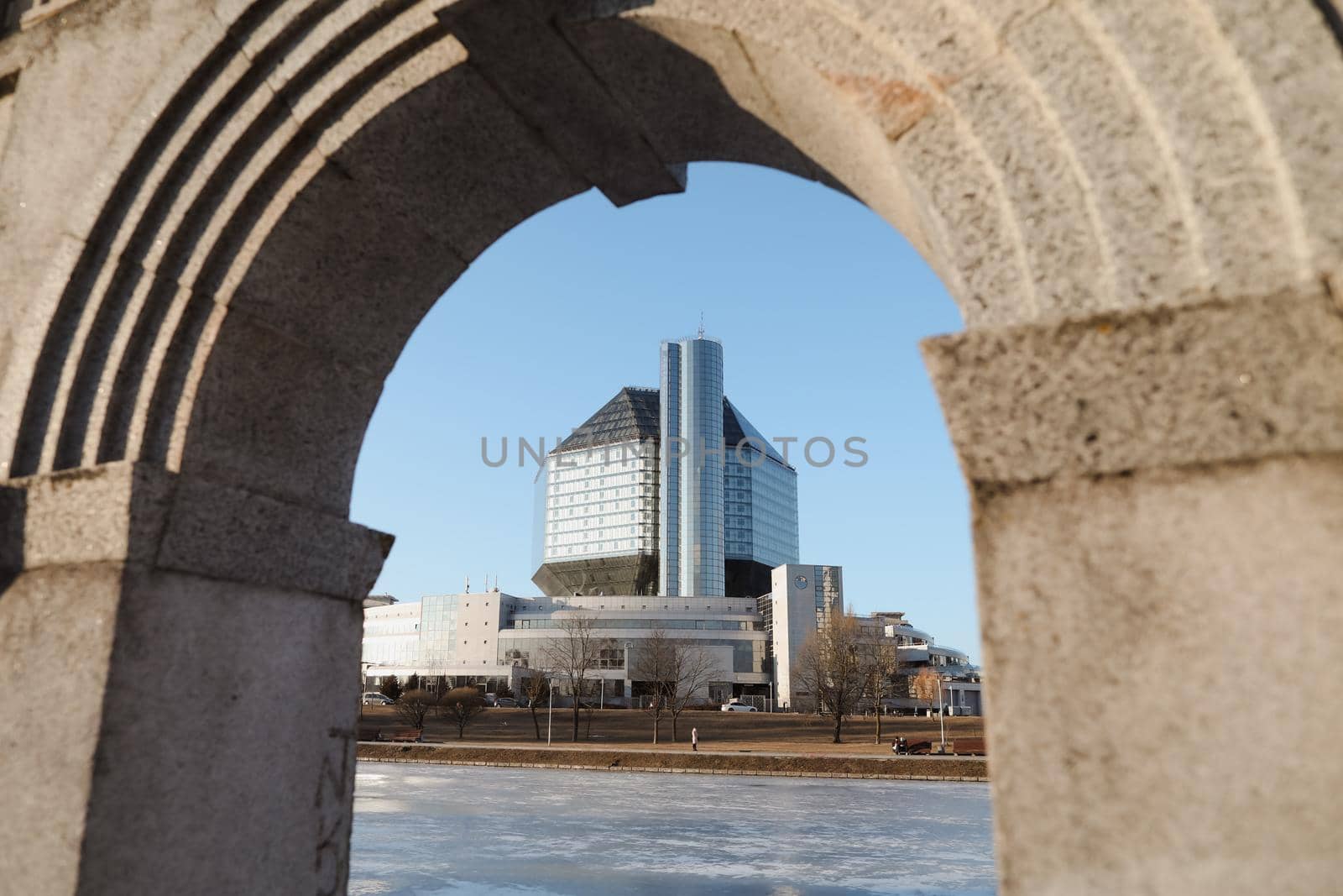 The urban landscape of large city. Exteriors of typical modern apartment buildings against a blue sky with clouds