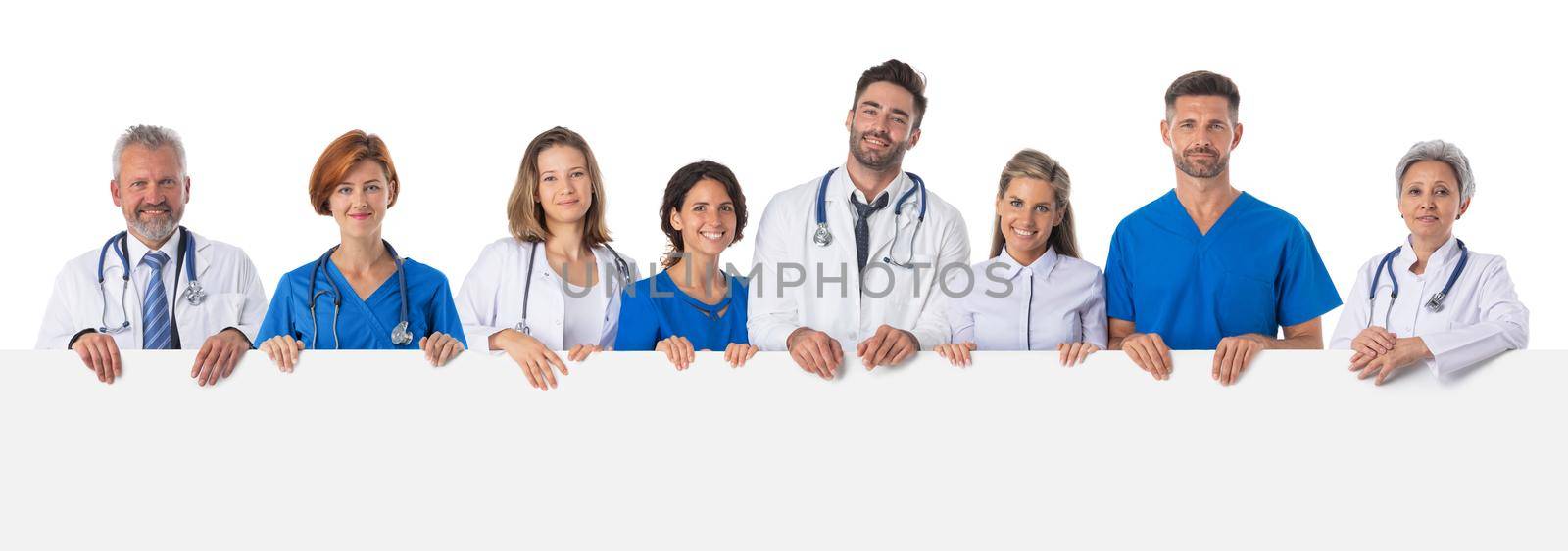 Medical doctors team holding blank billboard isolated on white background, copy space for text content