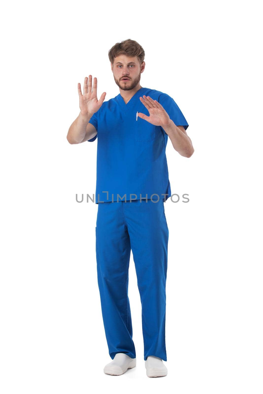Male nurse showing stop hand sign isolated on white background