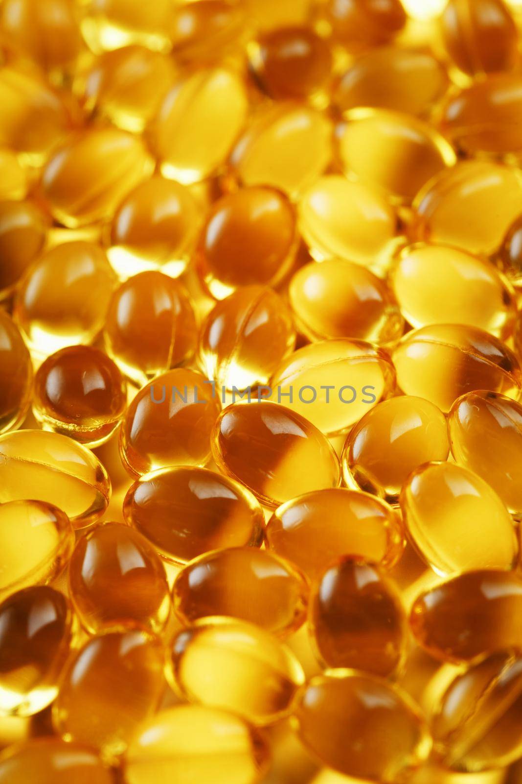 Background of capsules in a shell with vitamin Omega 3 Fish oil in full screen