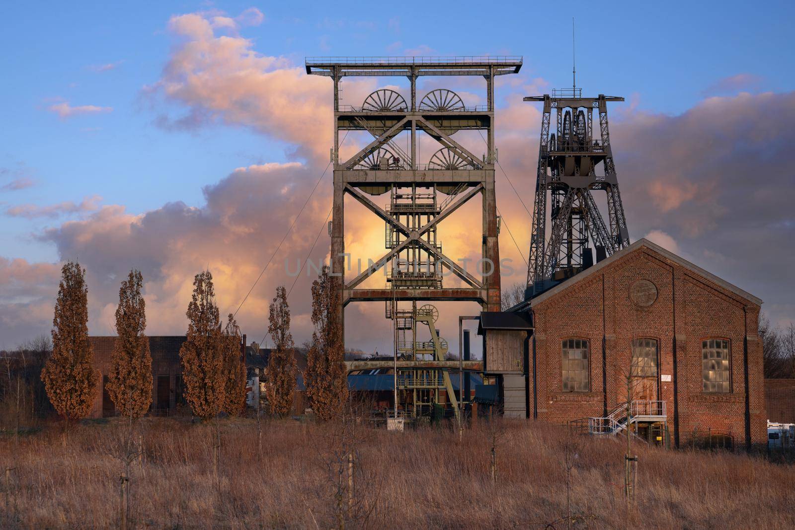 Headframe of old cold mine against sky, industrial heritage of Ruhr Metropolis, Dortmund, Germany