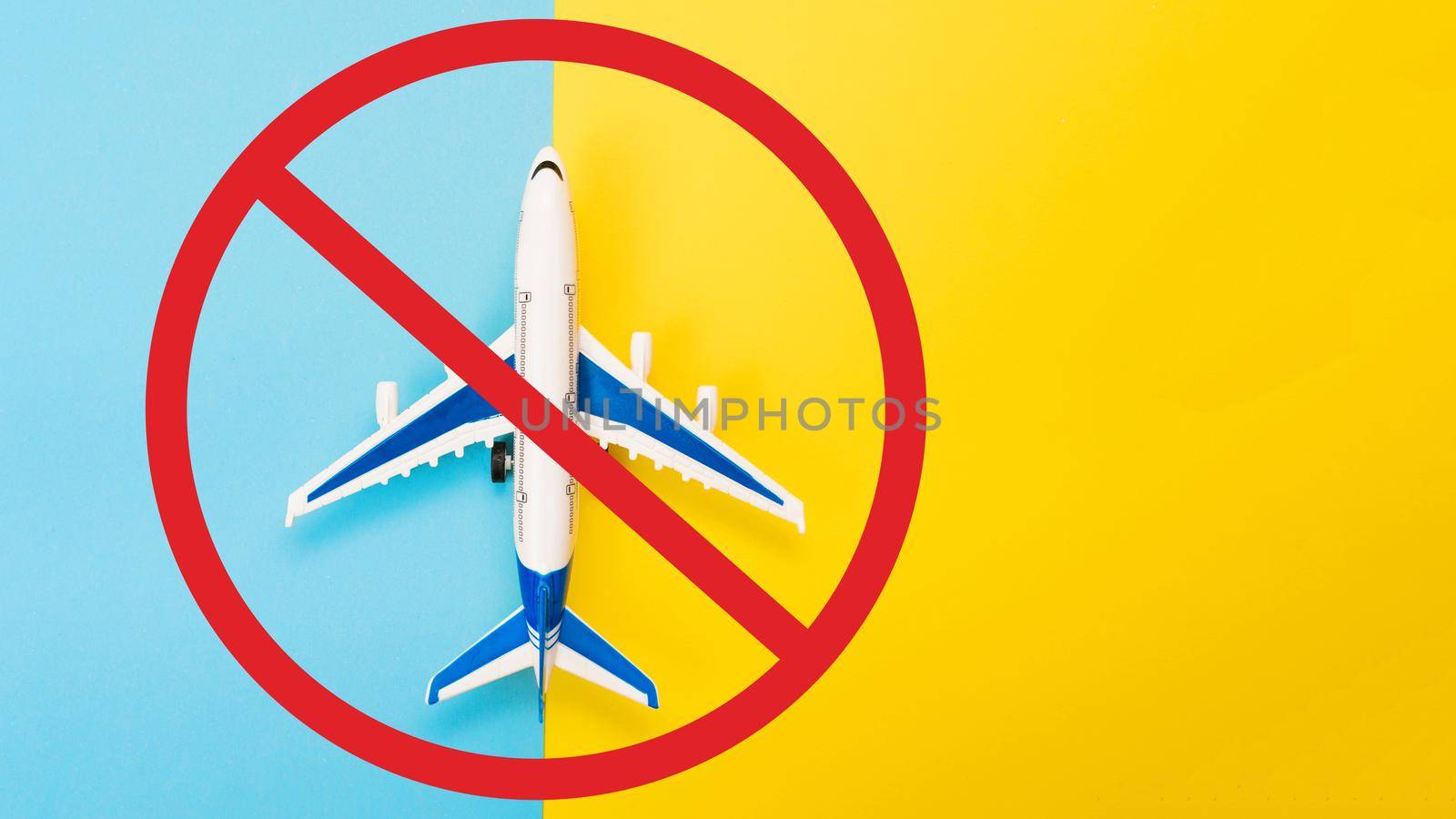 Abstract runway with an airplane model. Template for advertising flights. Coronavirus pandemic. Restriction of civilian flights, cancellation of flights on airplanes.