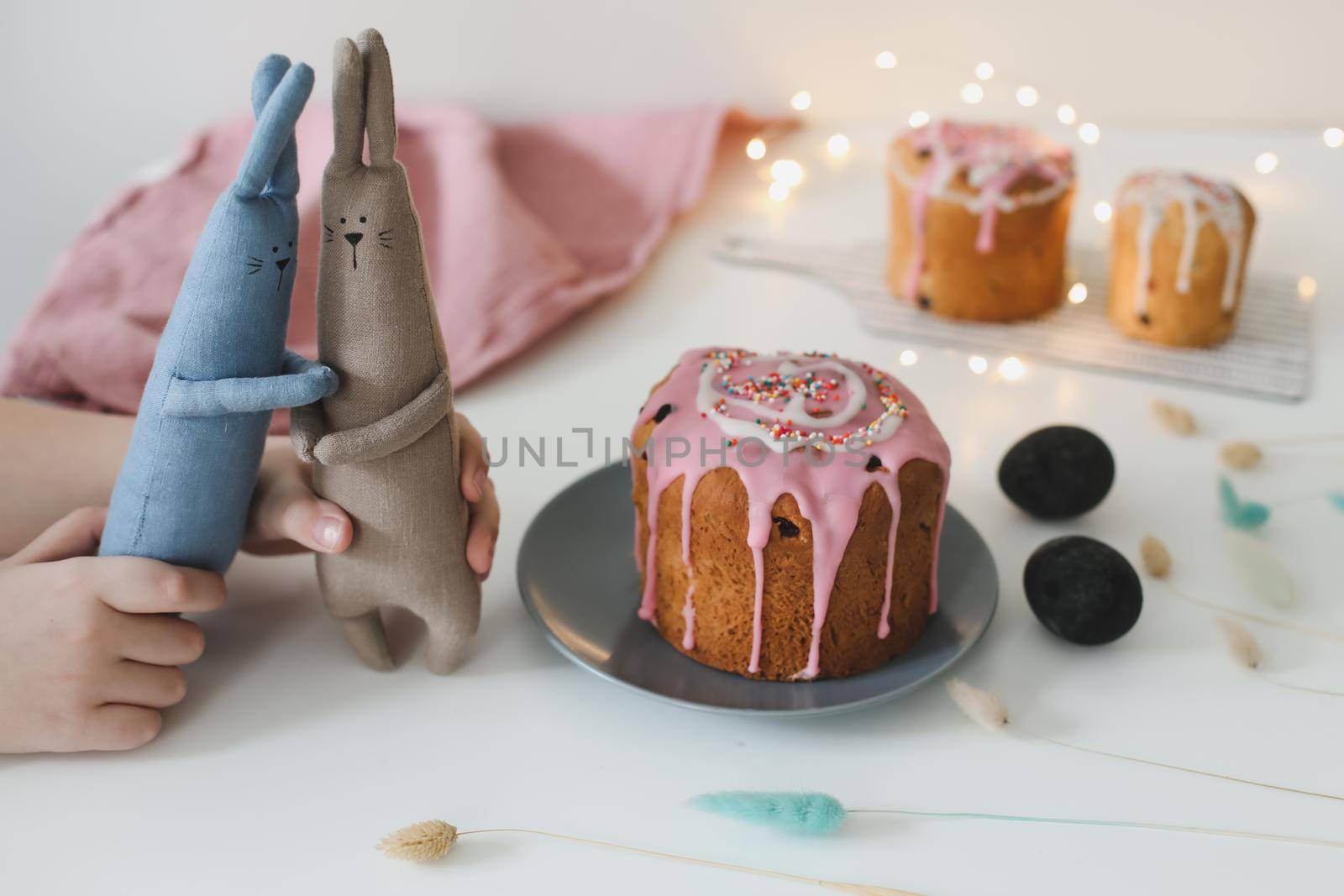 Easter cake, colorful eggs and rabbit toy. Happy Easter holiday concept. festive spring season.