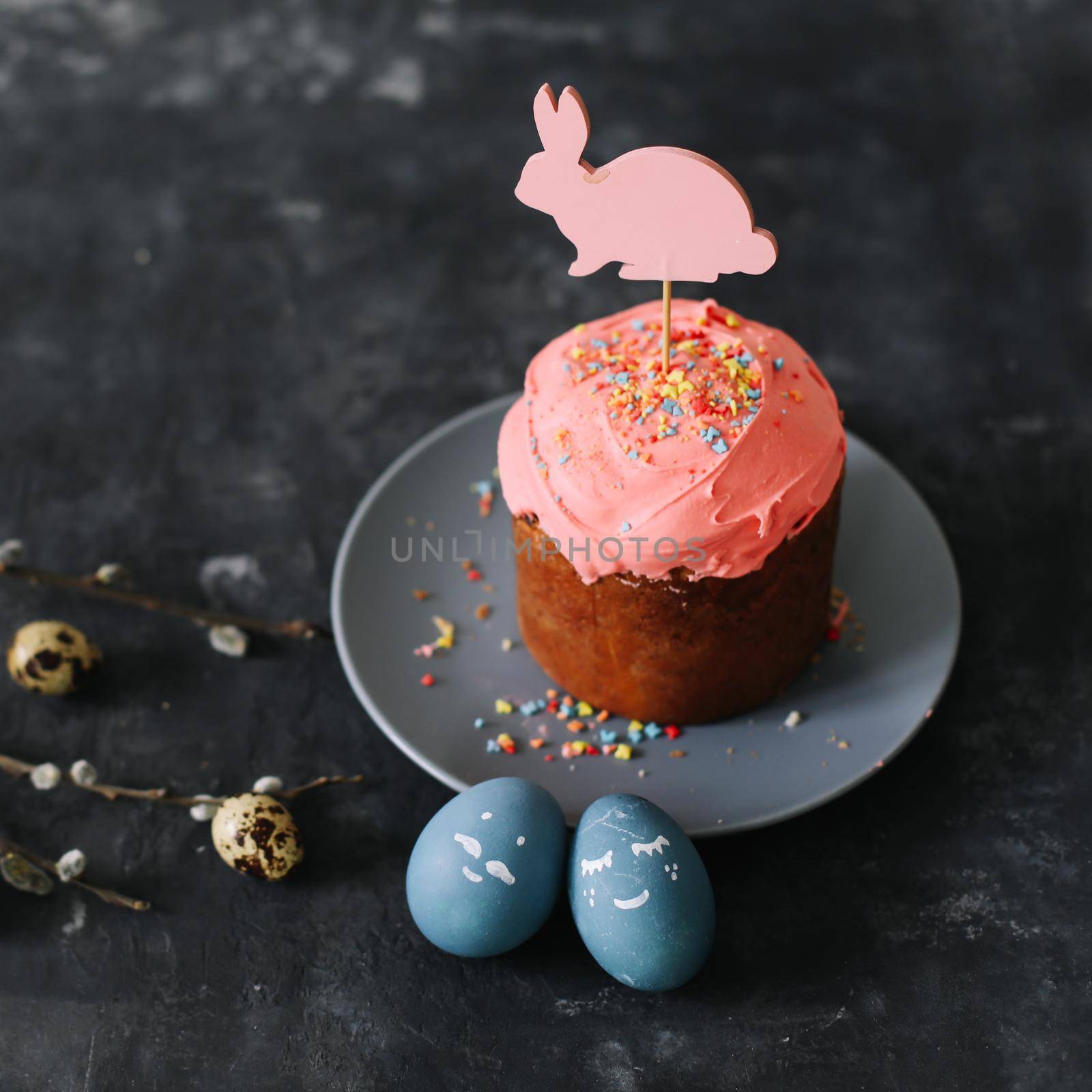 Easter cake, colorful eggs and willow branches. Happy Easter holiday concept. festive spring season.