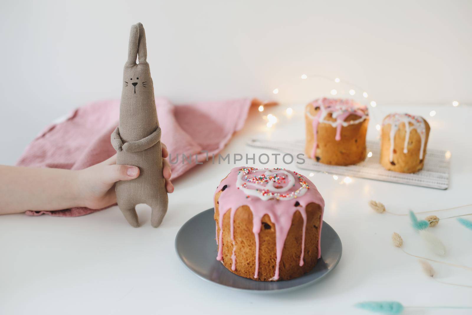 Easter cake, colorful eggs and rabbit toy. Happy Easter holiday concept. festive spring season.