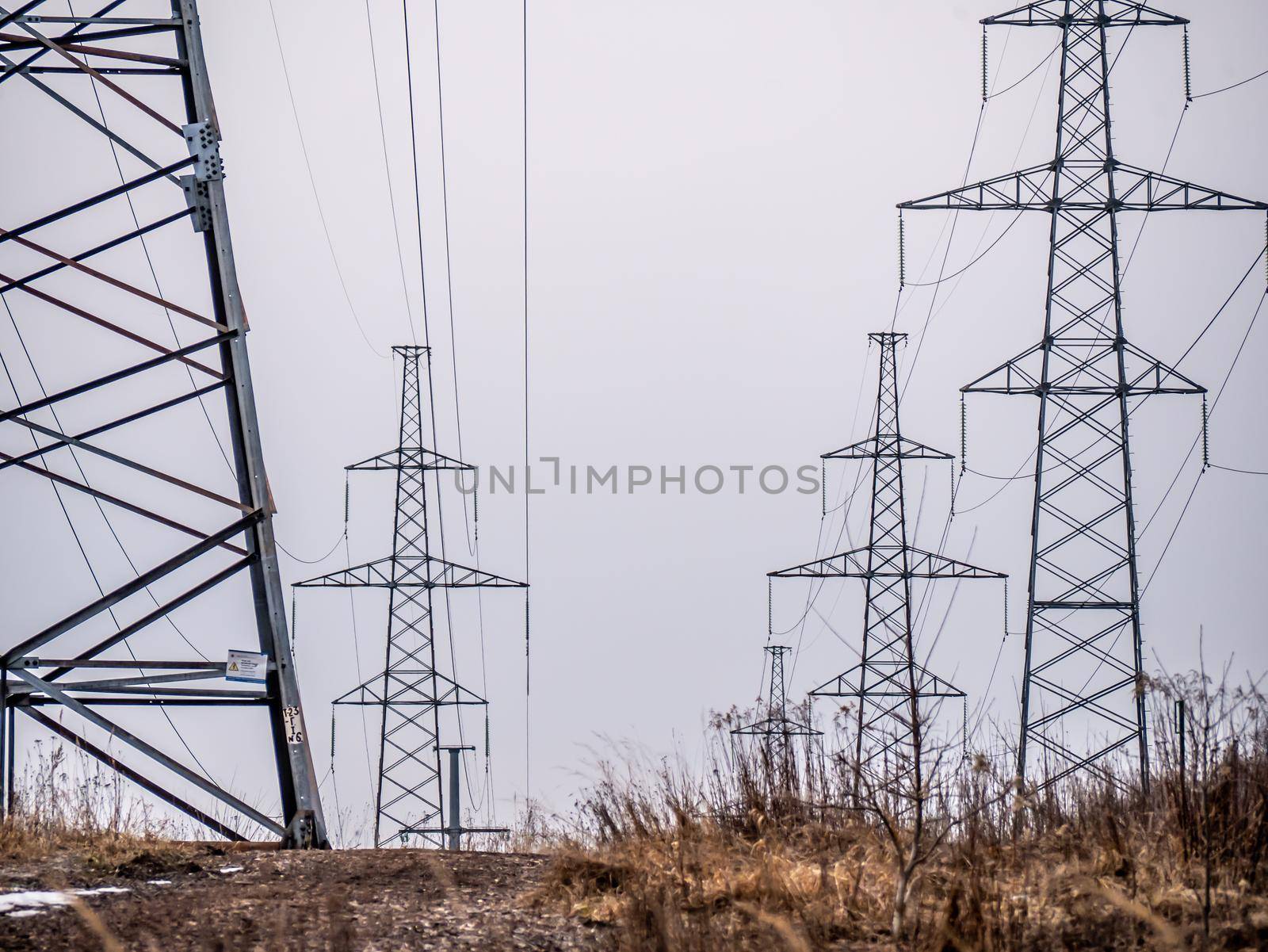 power lines in the fog in nature. general plan color by lempro