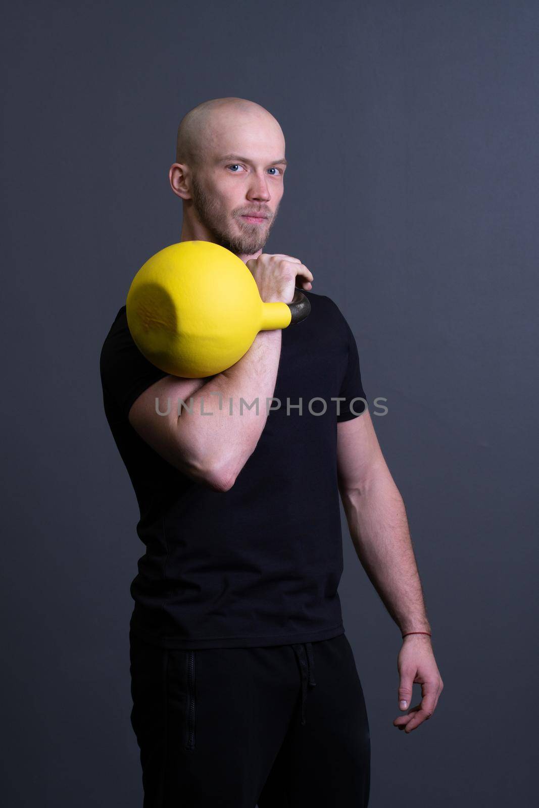 Guy with a yellow kettlebell gym anonymous yellow man, from sporty teenager from training from rubber youth, asian activity. Guy bent endurance, club hiit