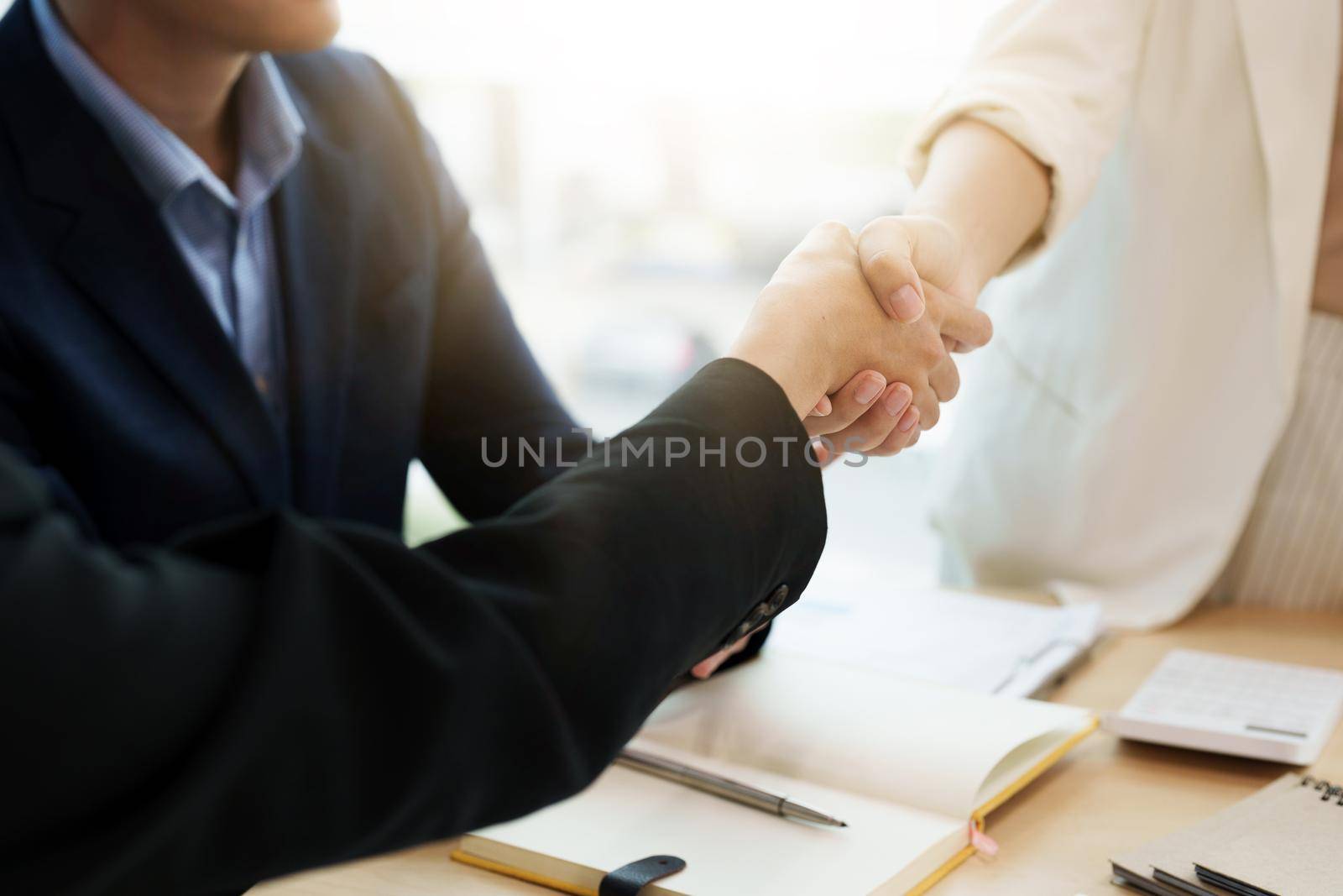 Business asian people shaking hands, finishing up meeting, business etiquette, congratulation, merger and acquisition concept.