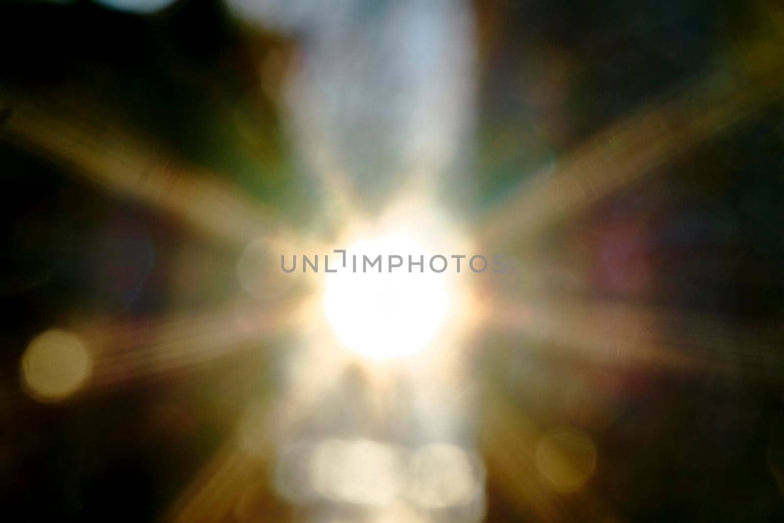 abstract sun between two houses color blur by lempro