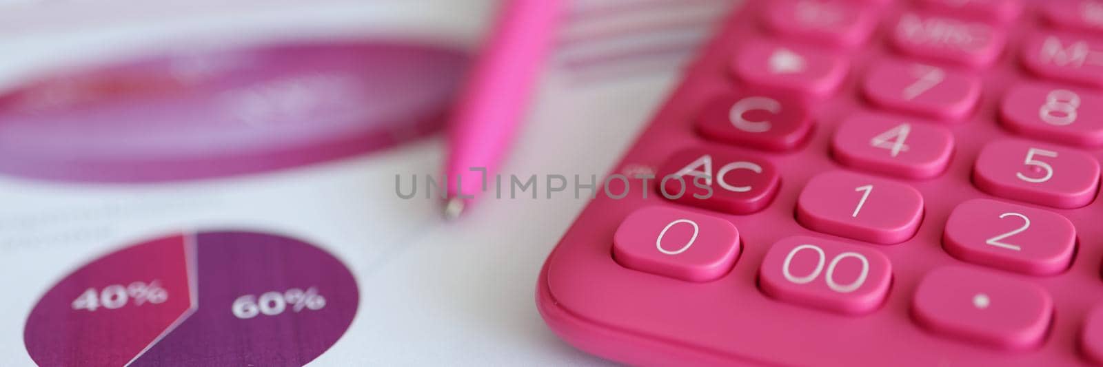 Desk of womans worker in pink colours by kuprevich