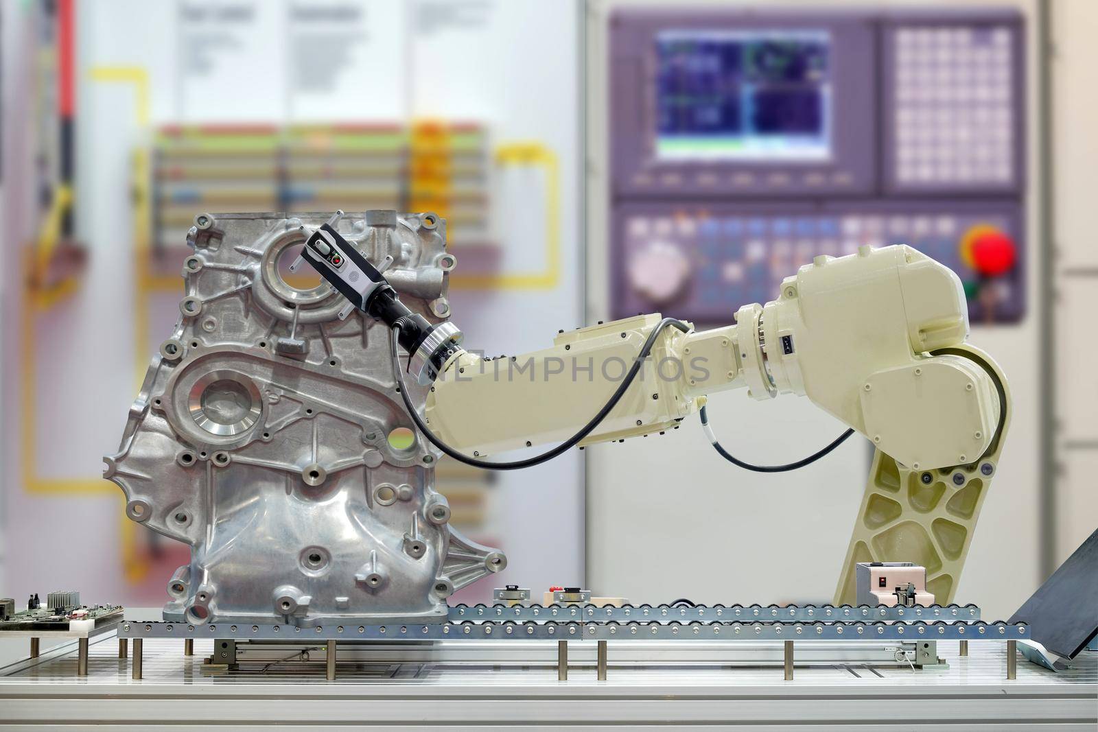 Industry robotic installed 3D scan for work scanning part of automobile via conveyor belt on smart factory on blurred control panel background, industrial 4.0