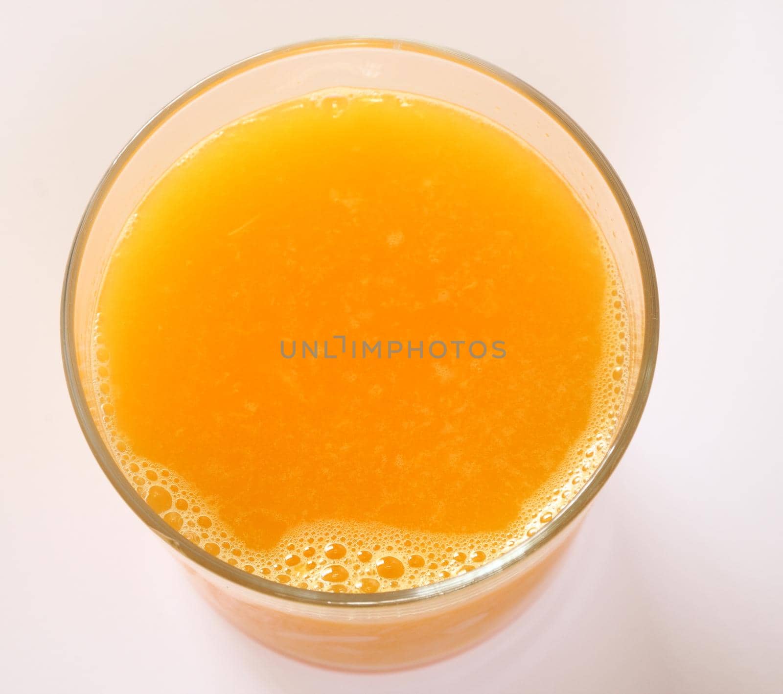 top view of orange juice glass (close up)