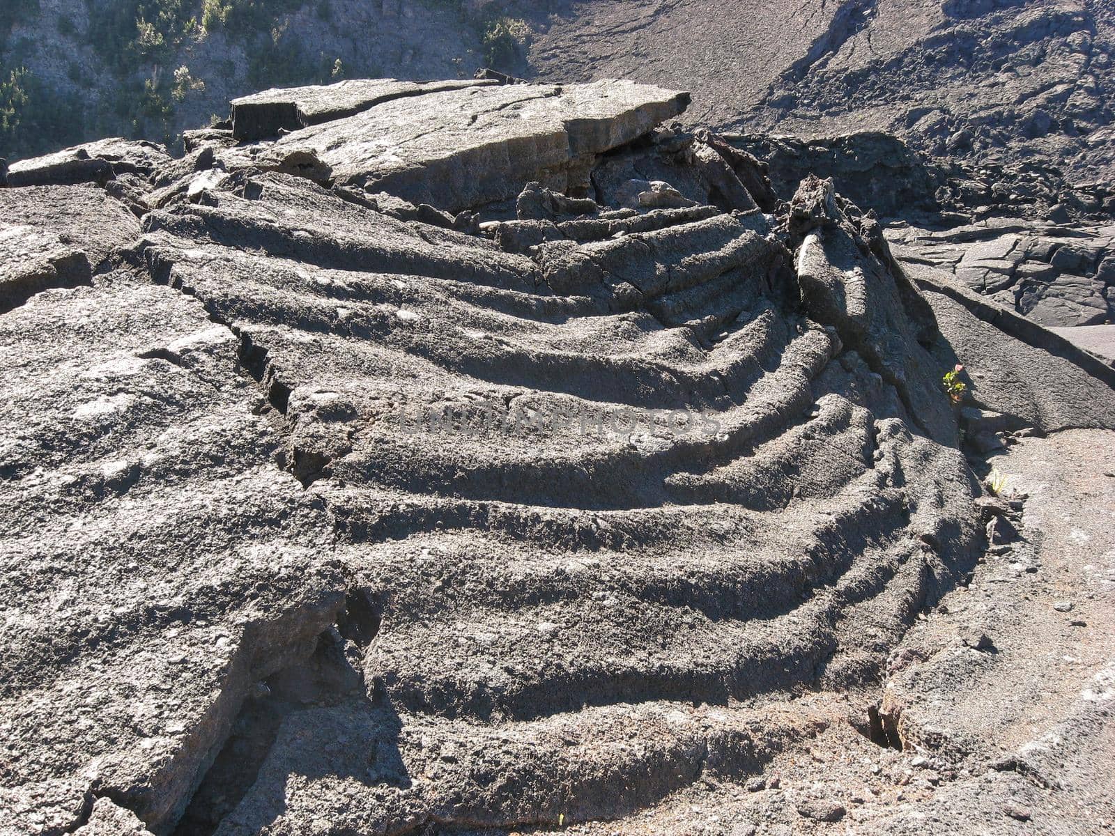 Solidified and cooled Pahoehoe Lava at Volcanoes National Park in Hawaii makes tapestry like folds by markvandam