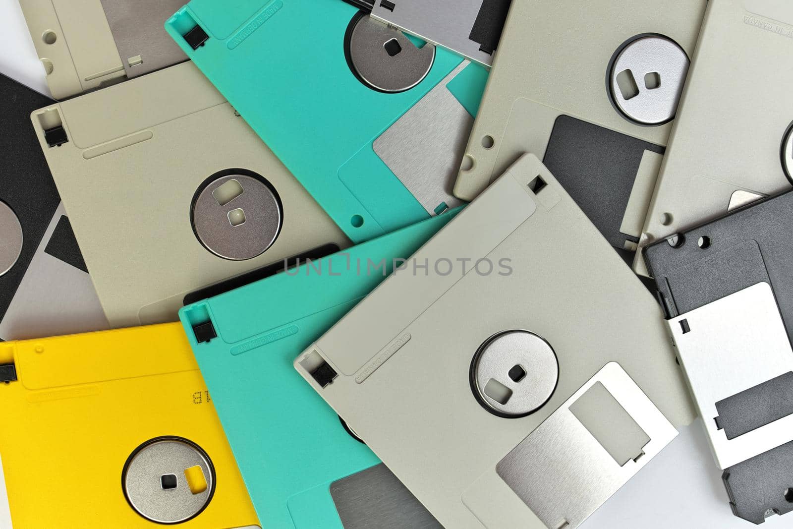 Directly Above Full Frame Close up of 3.5 Inch Floppy disks for background. Retro digital storage technology.