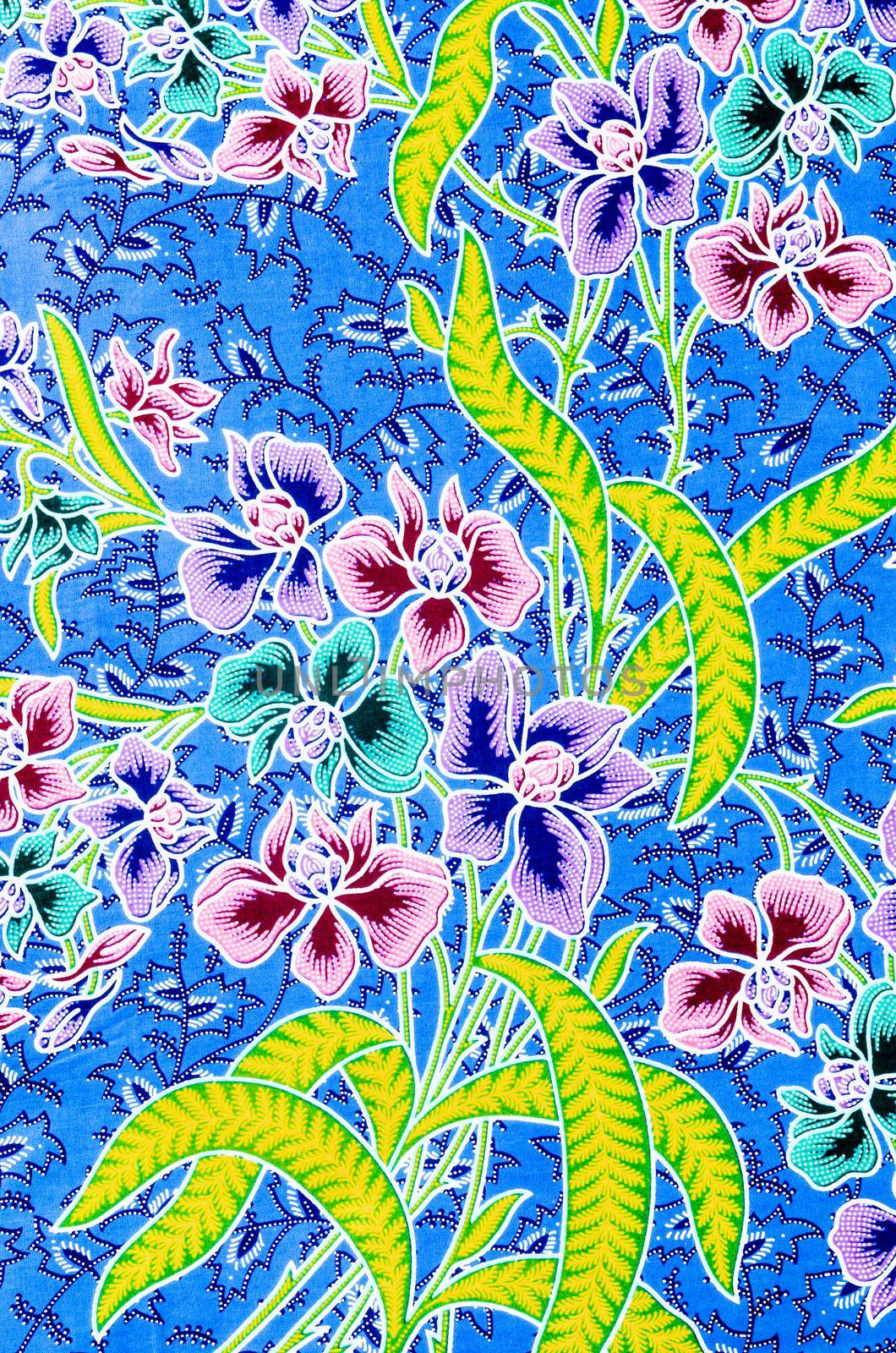 Traditional batik sarong pattern background. by Gamjai