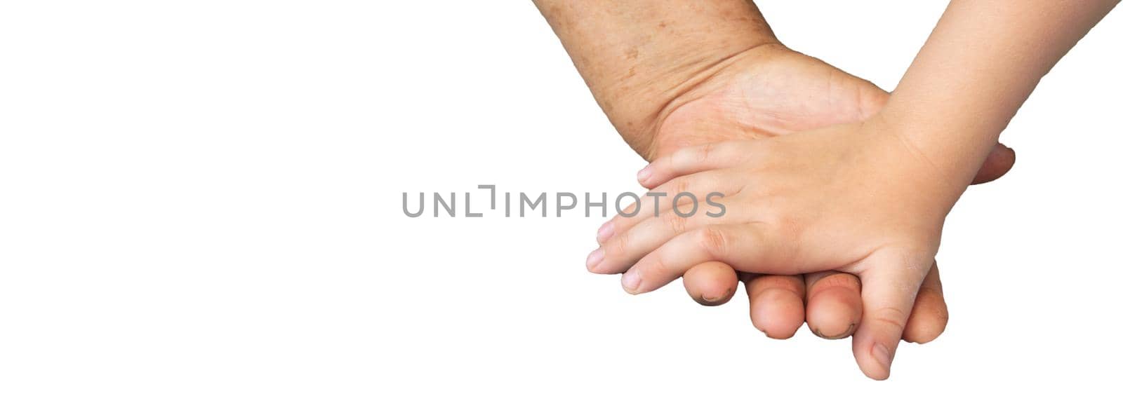 Banner, close-up of the hands of an elderly woman and a small child, isolated on a white background, by clipping. Soft focus image by claire_lucia