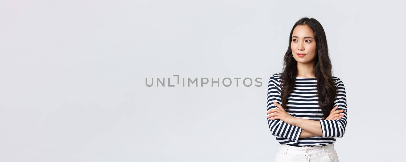 Lifestyle, people emotions and casual concept. Confident nice smiling asian woman cross arms chest confident, ready to help, listening to coworkers, taking part conversation by Benzoix