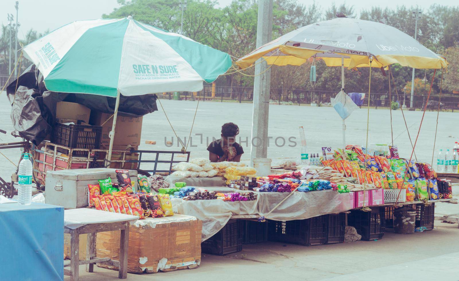 Road side food stalls or street food shop display, selling food and drink items in hot summer. New Town Eco Park, Rajarhat Kolkata India South Asia Pacific March 22 2022 by sudiptabhowmick