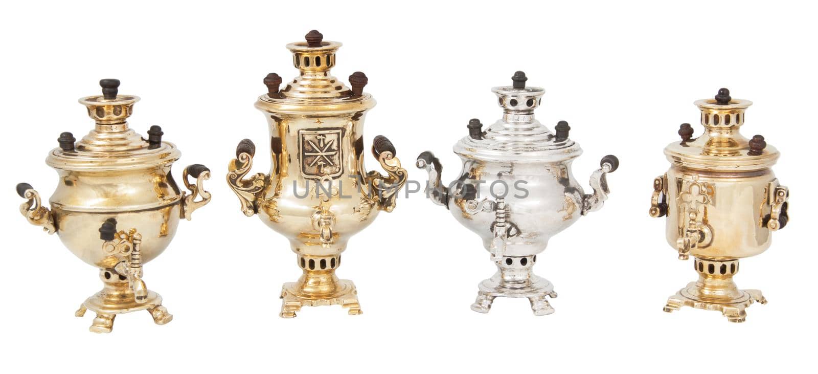 Row of four 2 inch souvenir samovars.