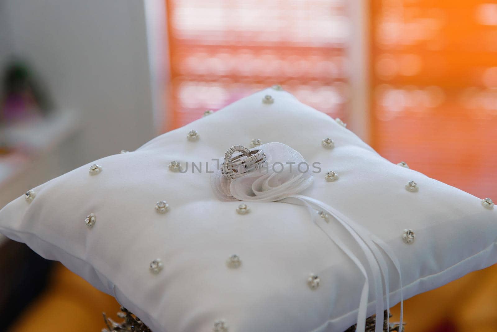 Beautiful gold background with wedding rings by ungvar