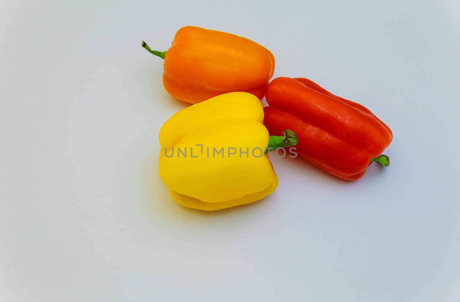colorful mini peppers on white background pepper on a white background