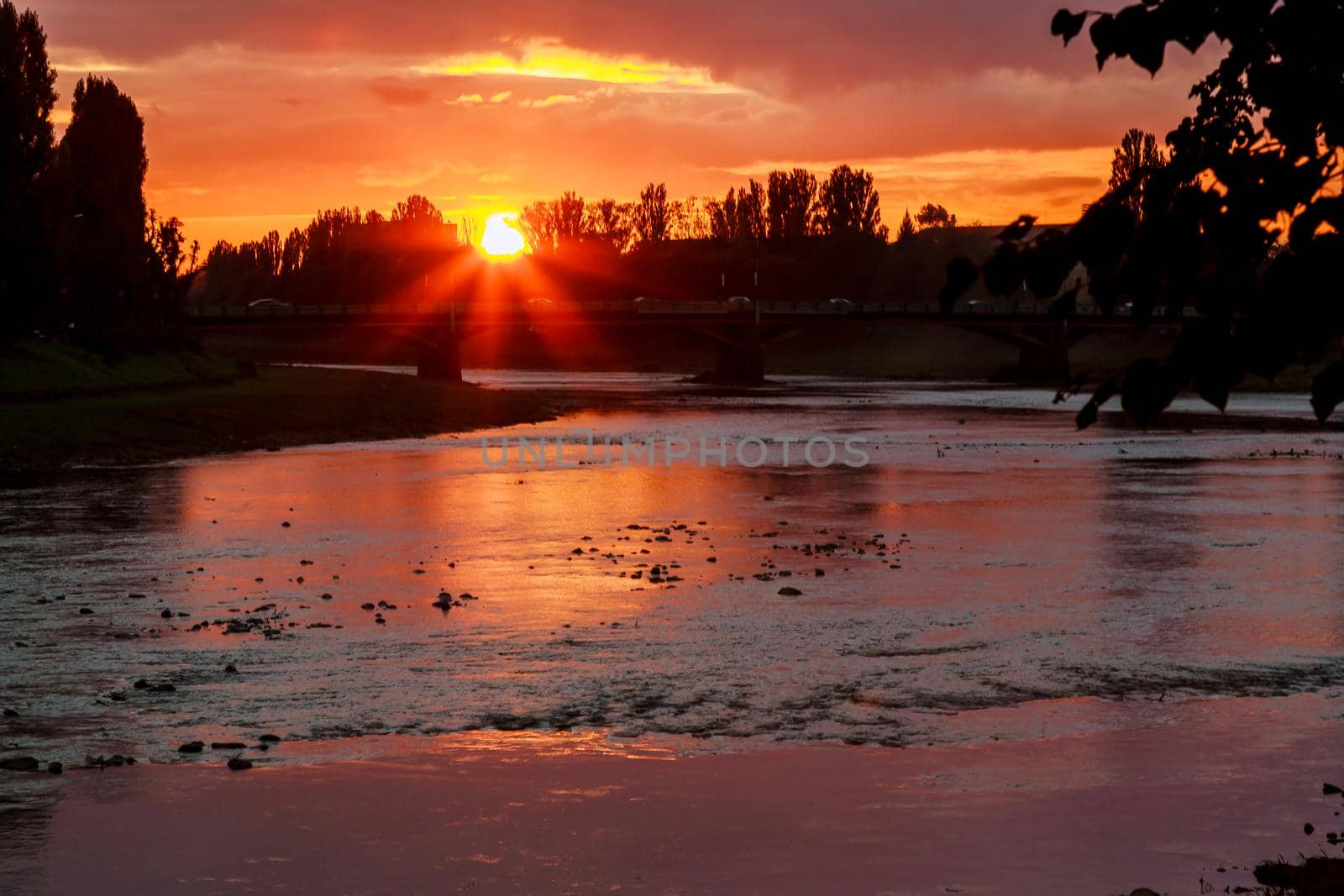 sunset on the background of the river river bank sunset Uzgorod Ukraine