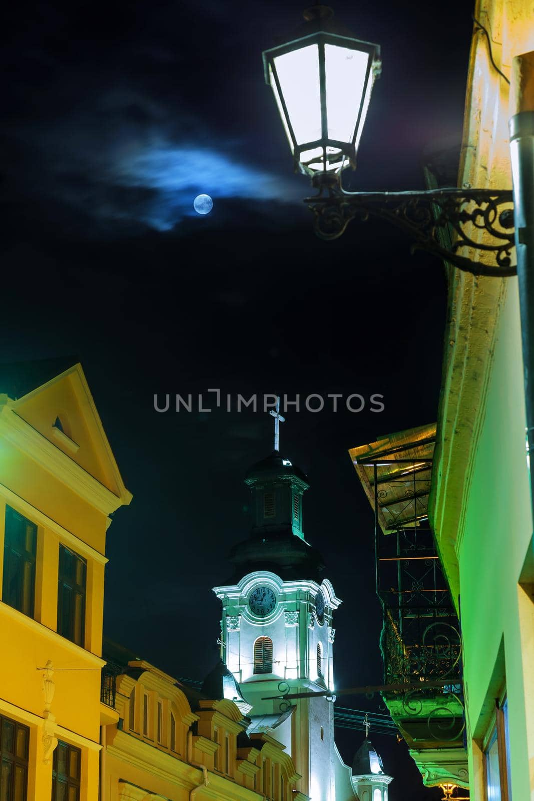 Old European church in full moon night by ungvar