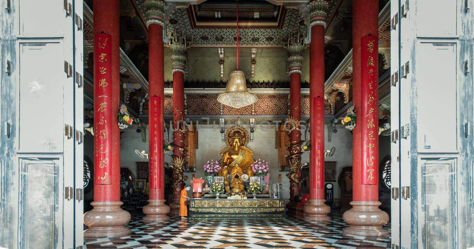 Architecture of chinese-style temple with the Golden buddha statue inside the Wat Bhoman Khunaram. by tosirikul