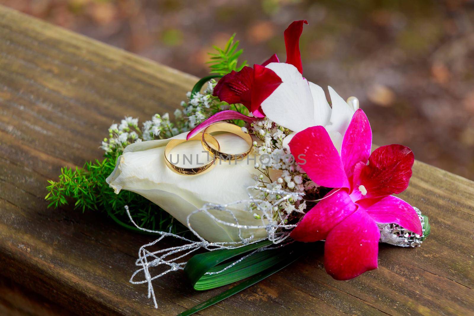Wedding rings near the bouquet Wedding rings and accessories