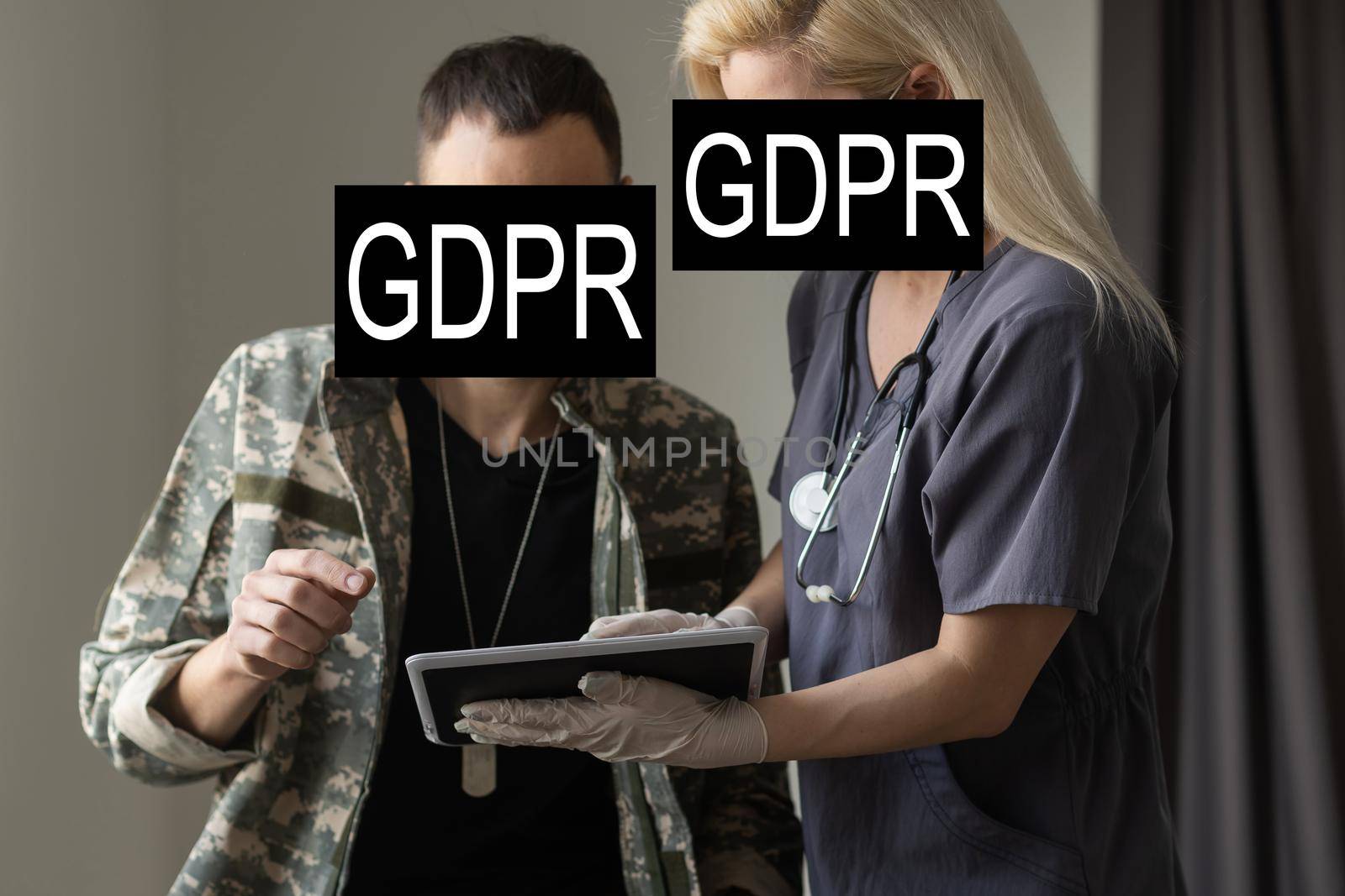 GDPR (general data protection regulation) concept. Businessman or IT technologist with text GDPR and icons of people.