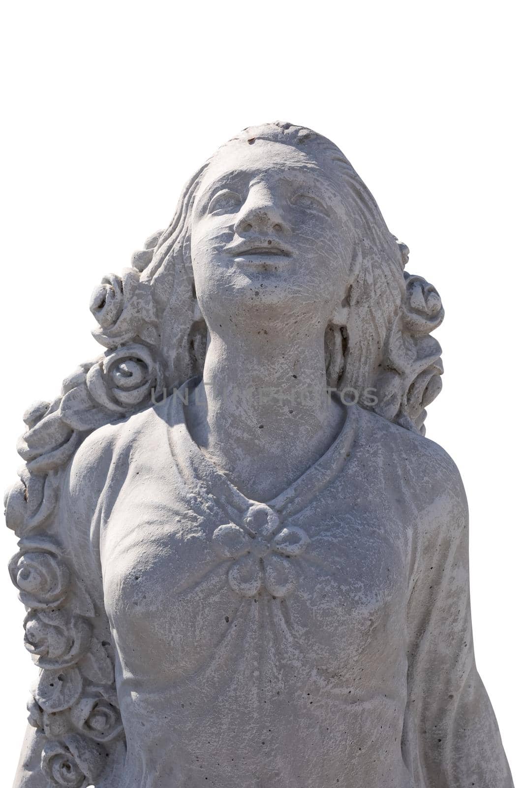 Close up of stone sculpture of woman looking up on white background by Wavebreakmedia