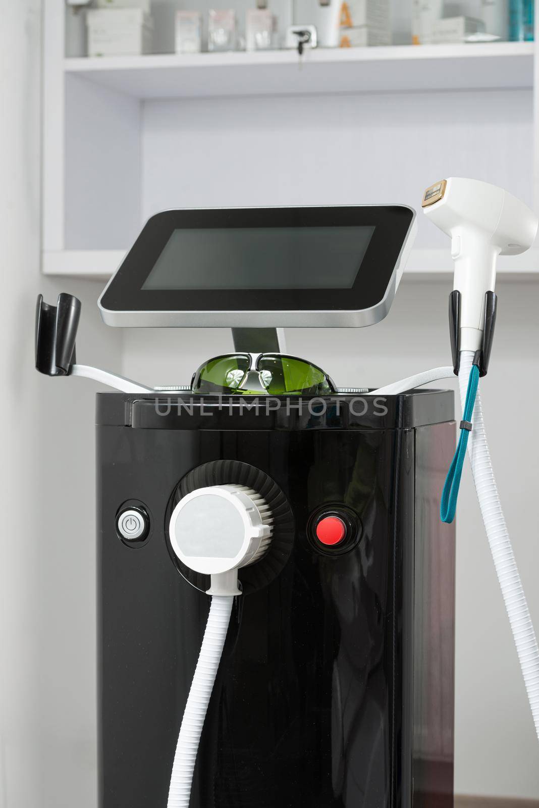 Modern equipment for laser hair removal in a beauty salon. Beauty salon and cosmetology by Ashtray25