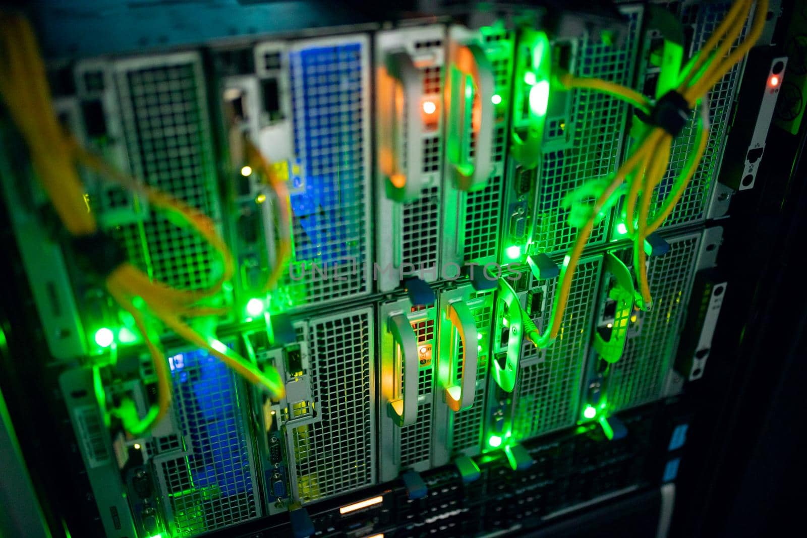 Closeup of computer server with colorful lights and wires. digital information storage and communication network technology.