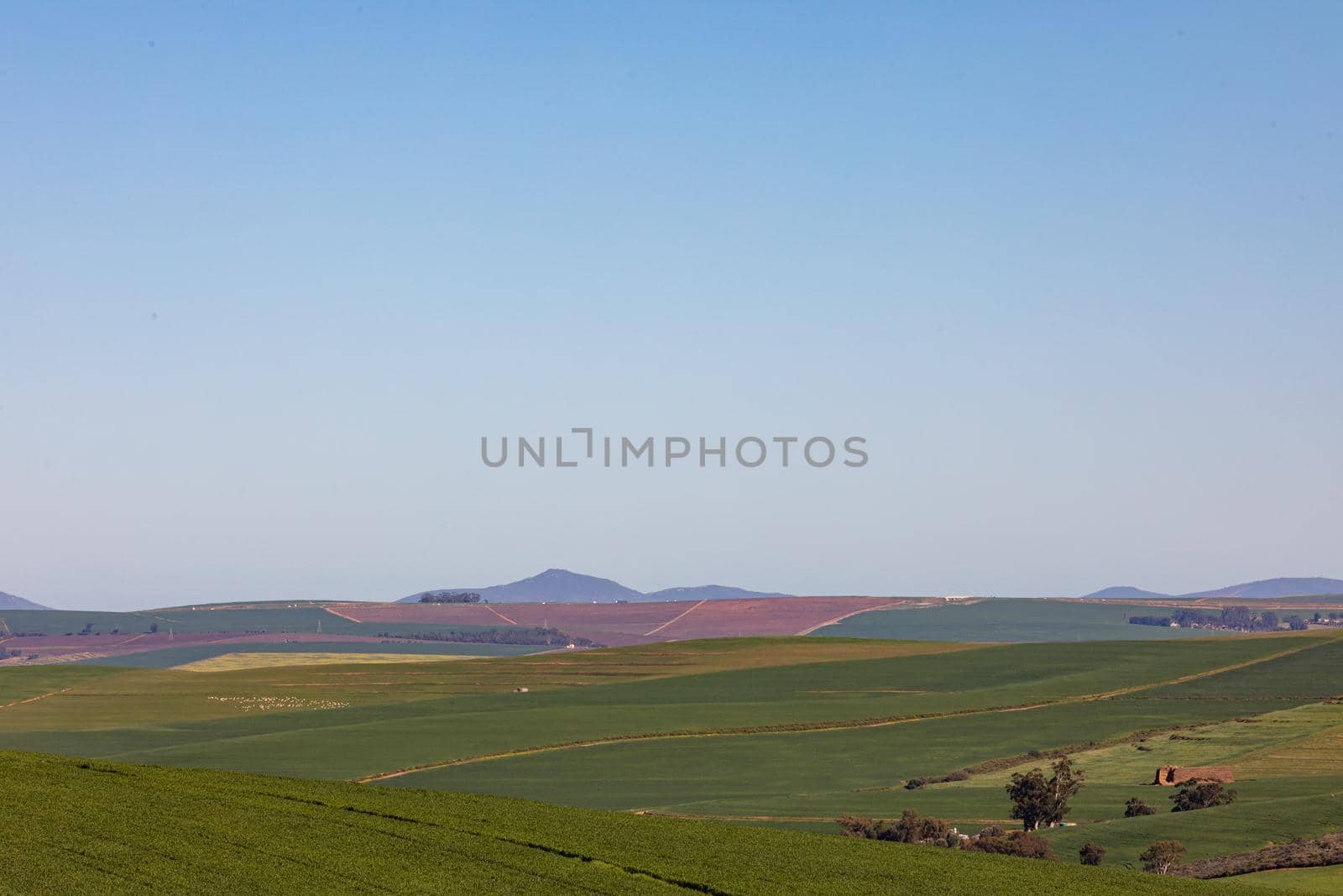 General view of countryside landscape with cloudless sky. environment, sustainability, ecology, renewable energy, global warming and climate change awareness.