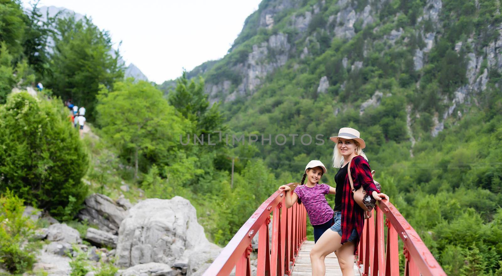 Traveling mother and daughter in the mountains of albania.