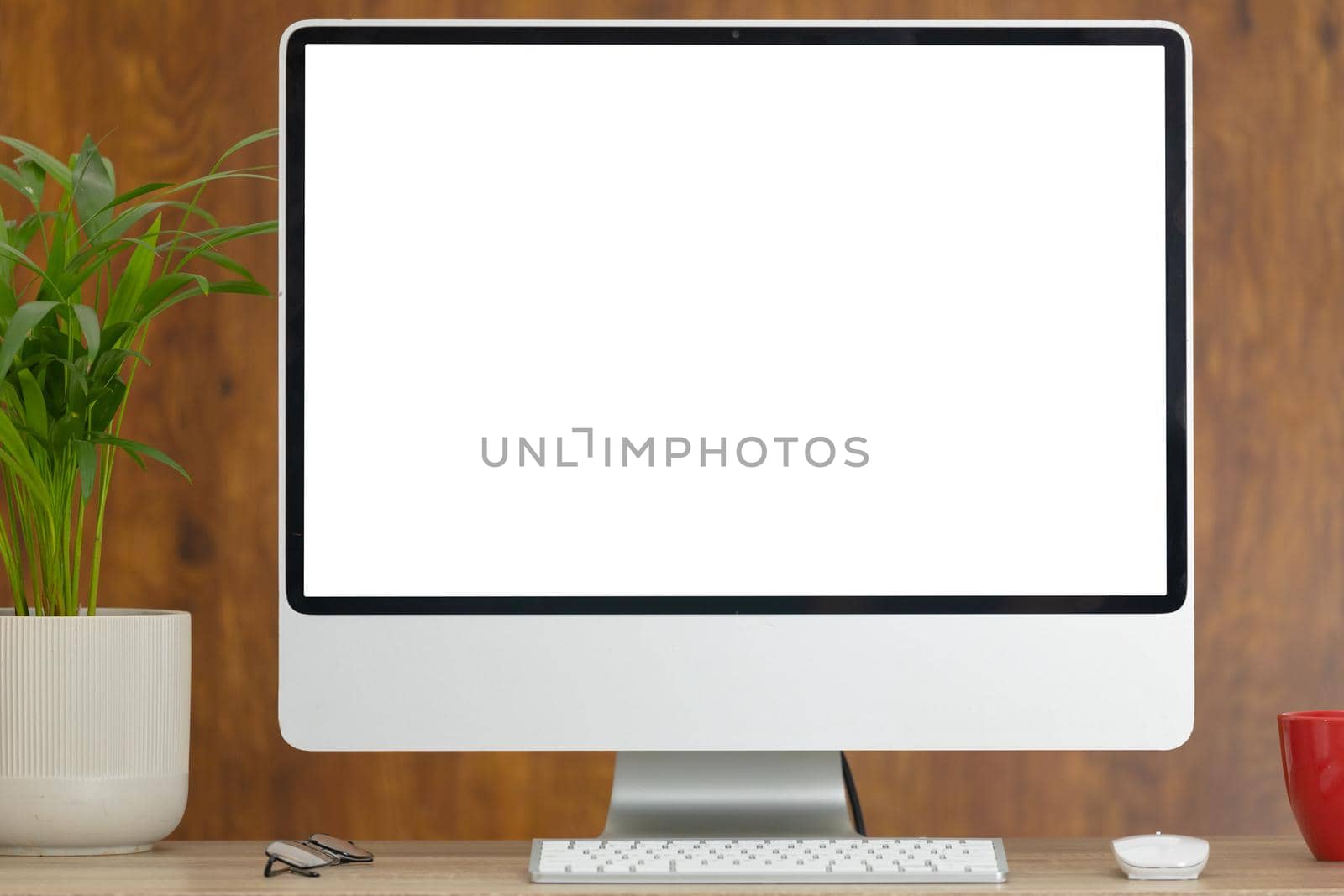 Composition of desktop computer with copy space on wooden background. modern office communication and technology concept.
